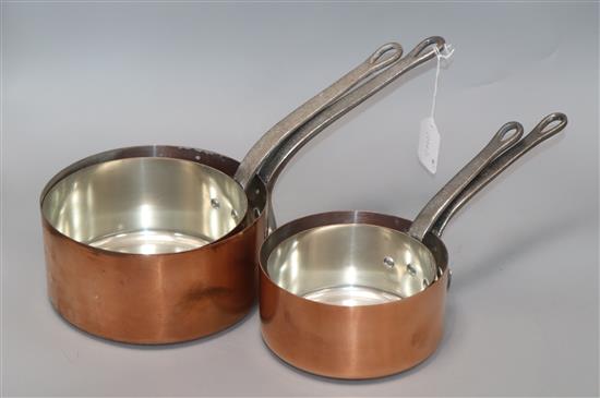 Four graduated French copper saucepans